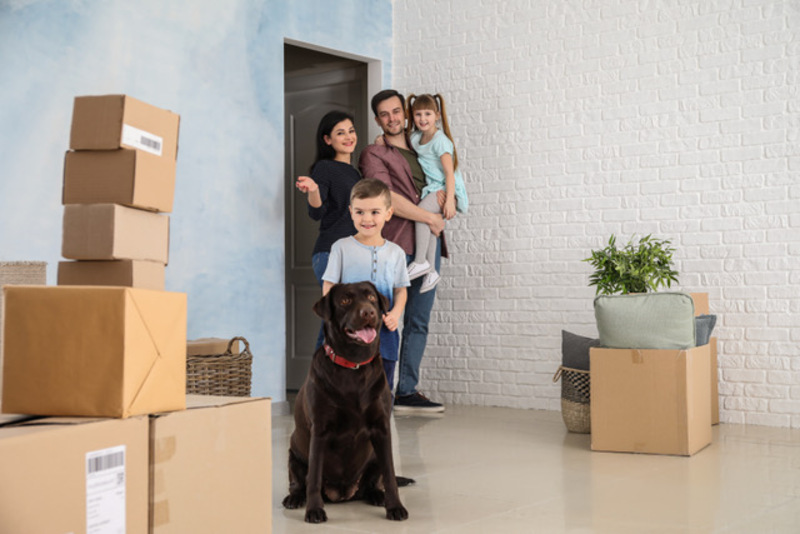 family moving into new home with dog